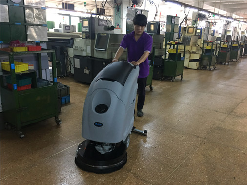 Cleaning application of hand push floor scrubber in machinery manufacturing industry