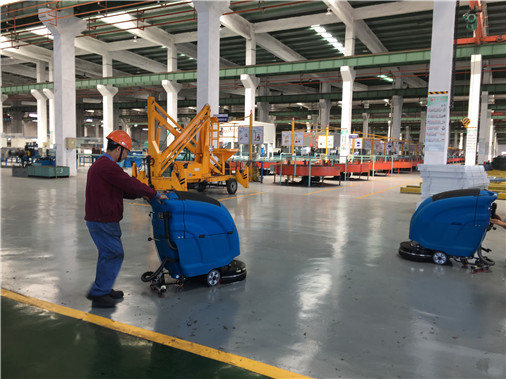 Cleaning application of hand push floor scrubber in machinery manufacturing industry