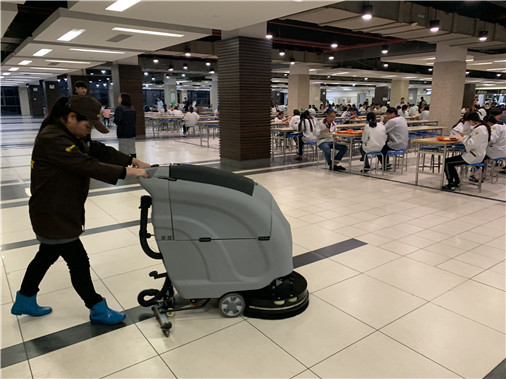 Floor washing machine is a good helper for cleaning the school canteen floor