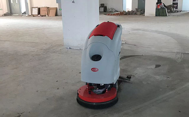 Can a fully automatic floor washing machine clean cement floors?