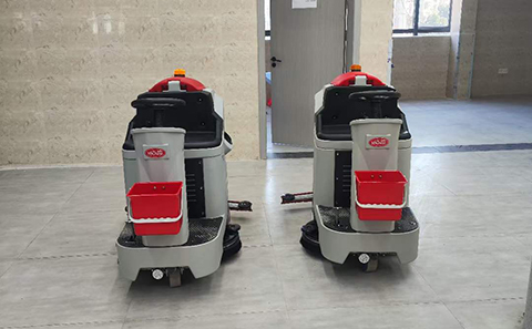 Ride-on floor scrubber